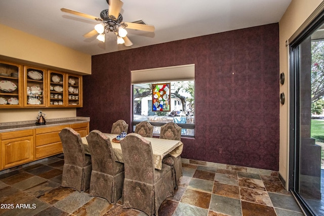 6334 E Albany St, Mesa, AZ 85205 - dining area featuring stone tile floors and ceiling fan