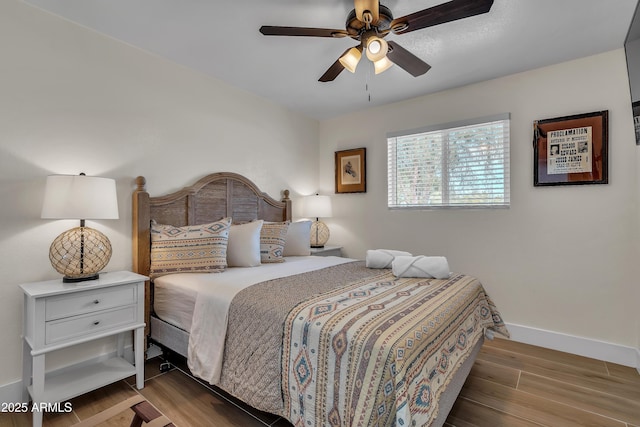 1209 E Marigold Ln, Tempe, AZ 85288 - bedroom with wood finished floors, baseboards, and ceiling fan