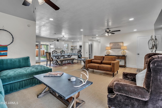 1209 E Marigold Ln, Tempe, AZ 85288 - living area with ceiling fan, light wood-style floors, and recessed lighting
