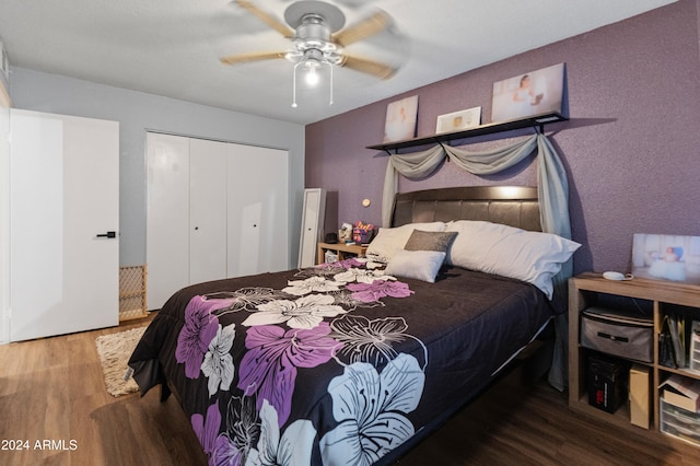 bedroom featuring a closet, ceiling fan, and hardwood / wood-style floors