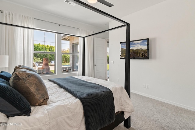 bedroom with baseboards, carpet, and visible vents