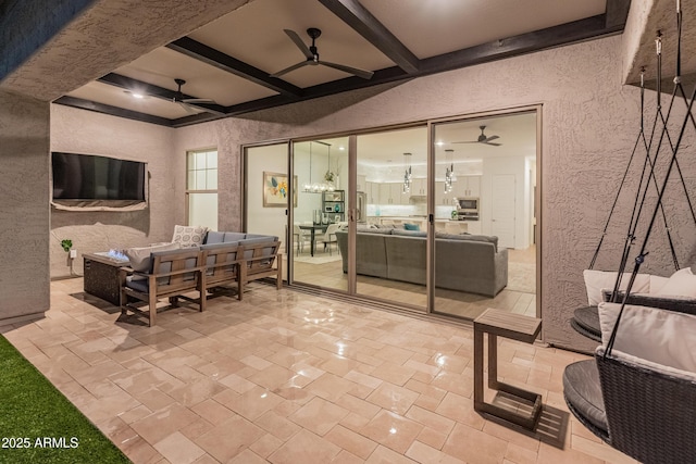 bedroom featuring a textured wall, beamed ceiling, coffered ceiling, and ceiling fan