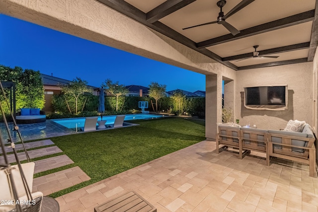 view of patio featuring ceiling fan and an outdoor pool