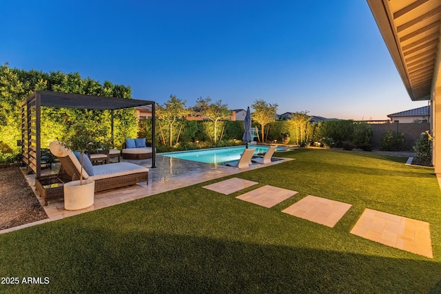 outdoor pool featuring an outdoor living space, a fenced backyard, a yard, and a patio area