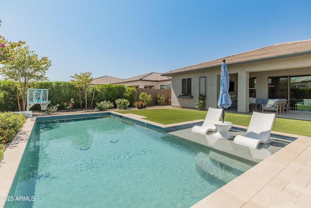 view of pool with a lawn, a fenced in pool, an outdoor hangout area, a fenced backyard, and a patio