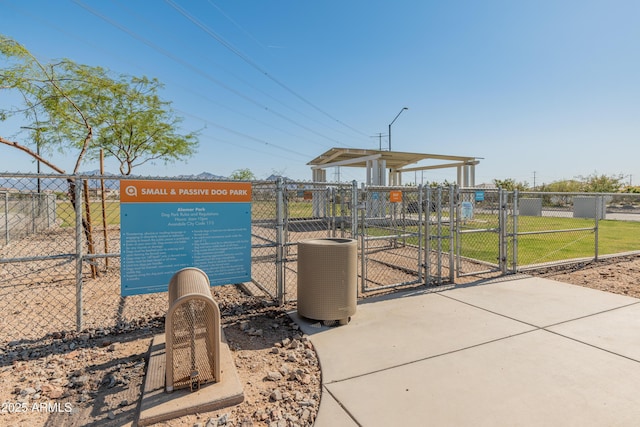 view of community with a gate and fence