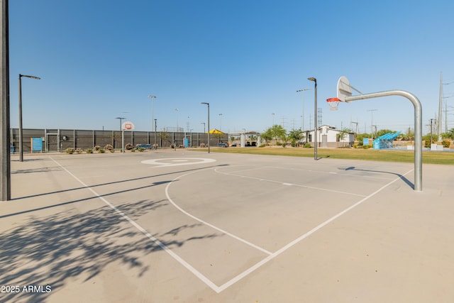 view of sport court featuring community basketball court and fence