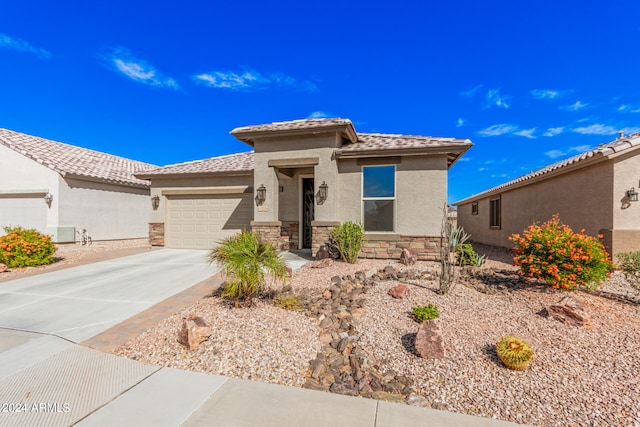 view of front of property with a garage