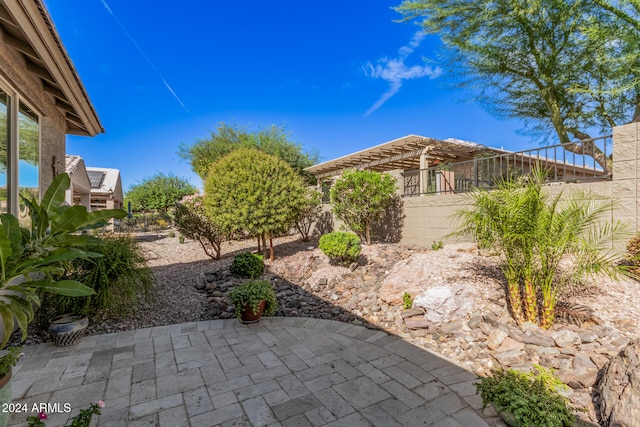 exterior space with a pergola