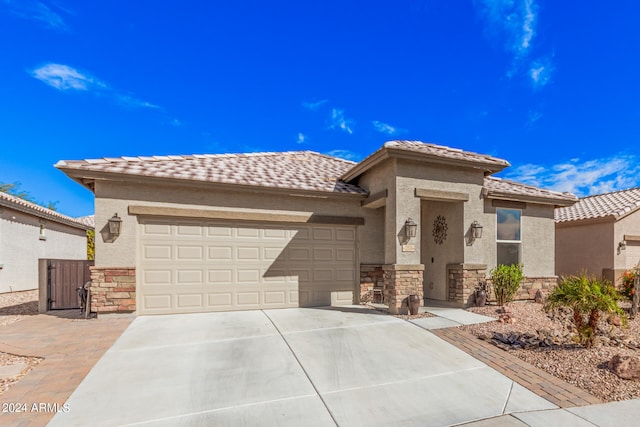 view of front of home with a garage