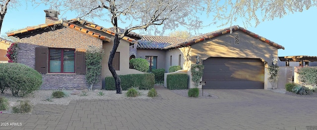 view of front of home with a garage