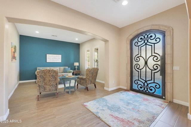 entryway with light hardwood / wood-style flooring