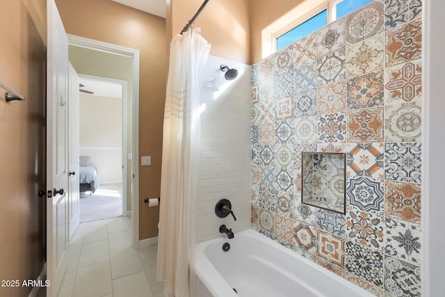 bathroom featuring tile patterned flooring and shower / tub combo with curtain