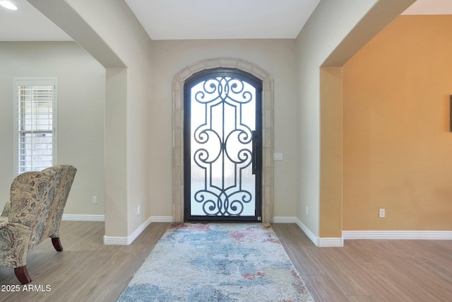 foyer featuring plenty of natural light and light hardwood / wood-style flooring