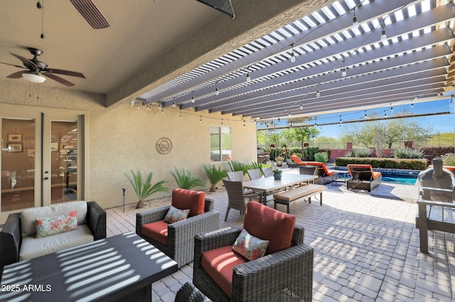 view of patio featuring outdoor lounge area and ceiling fan