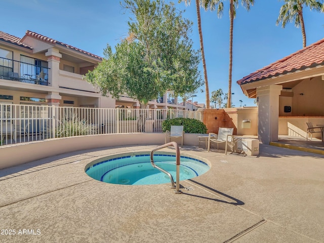 view of pool featuring ac unit, a hot tub, and a patio