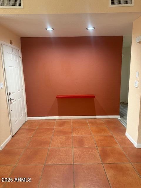 corridor with tile patterned floors