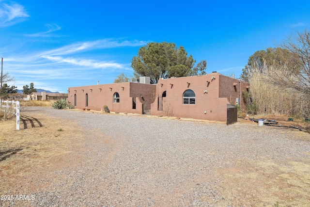 view of front of home featuring stucco siding