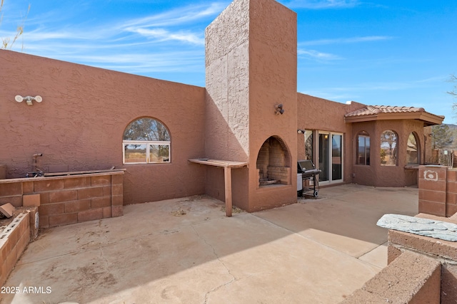 view of patio / terrace with a grill