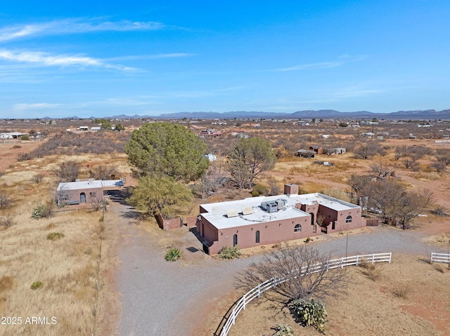 drone / aerial view with a rural view and a mountain view