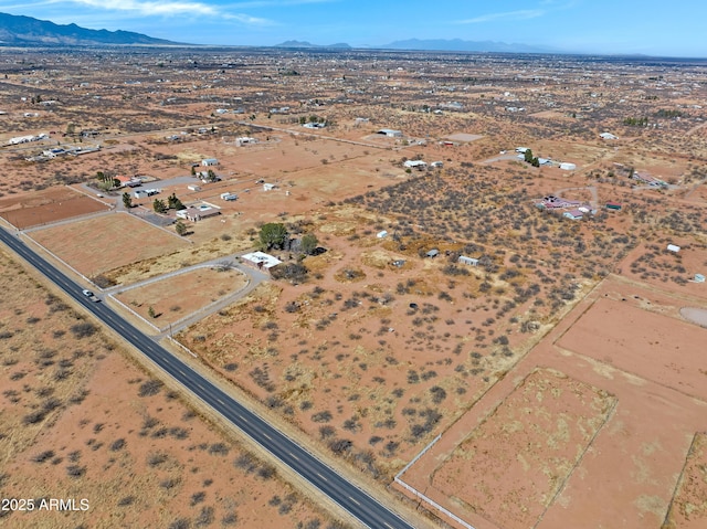 aerial view with a desert view and a mountain view