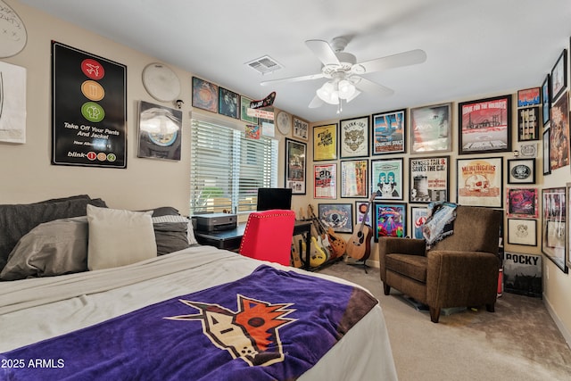 bedroom with ceiling fan and carpet