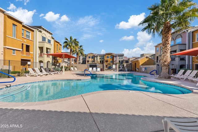 view of swimming pool featuring a patio area