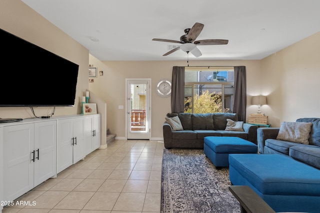 living room with light tile patterned flooring and ceiling fan