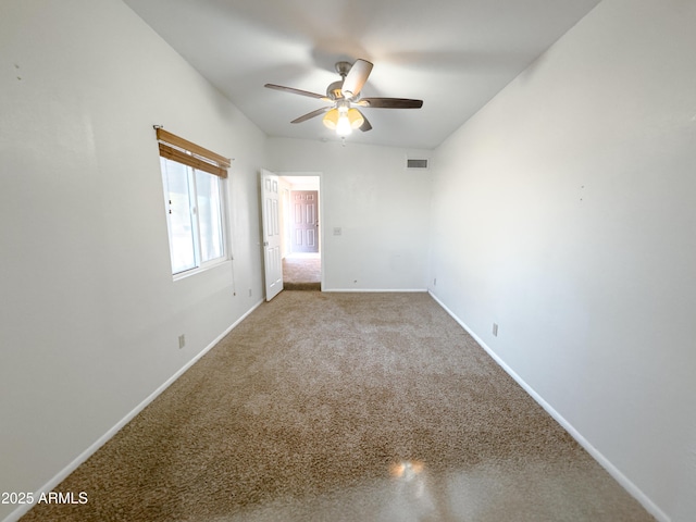 carpeted empty room with ceiling fan