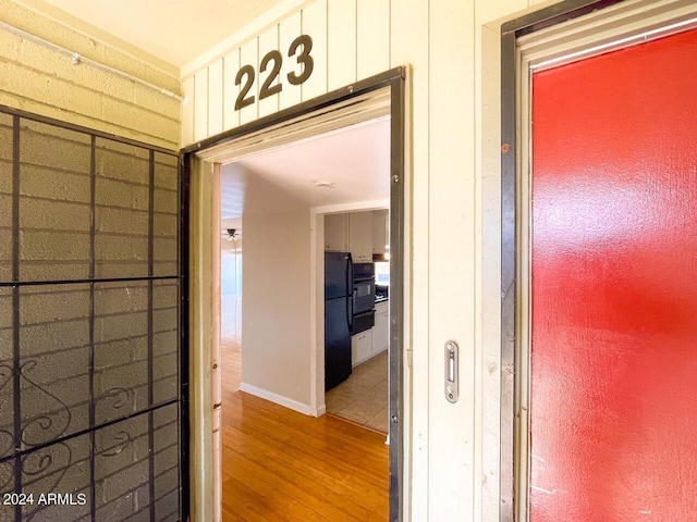 hall featuring hardwood / wood-style floors