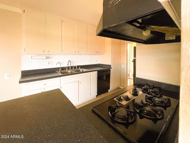 kitchen with white cabinets, black appliances, decorative backsplash, and sink