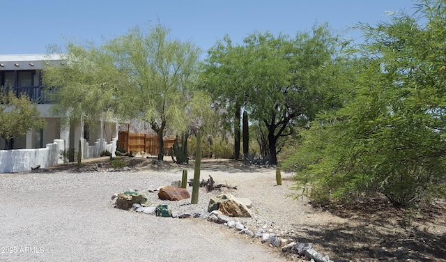 view of yard featuring fence