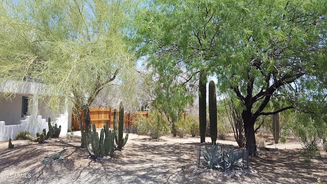 view of yard with fence