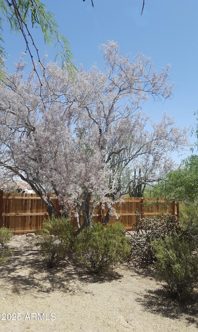 view of yard featuring fence