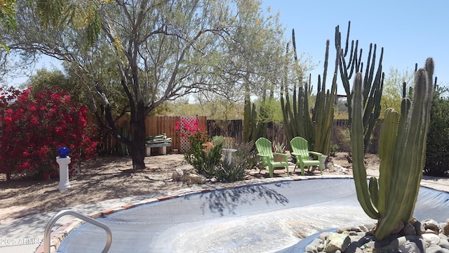 exterior space with a patio area and fence