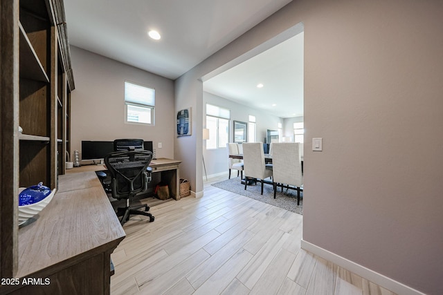 office with light wood-style flooring, recessed lighting, and baseboards