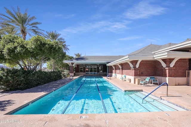 pool with a patio area