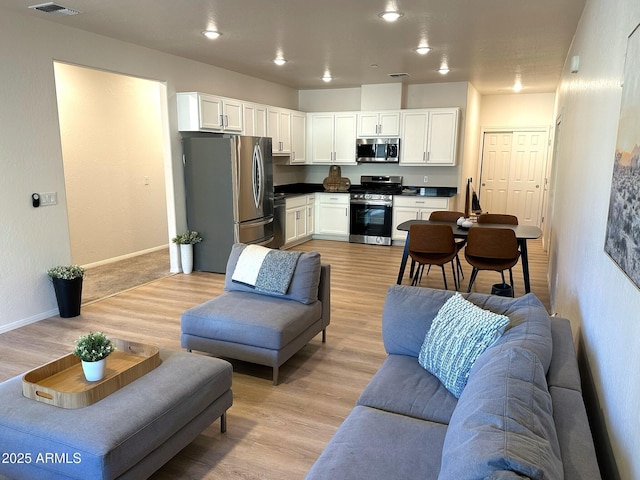 living room featuring light hardwood / wood-style flooring