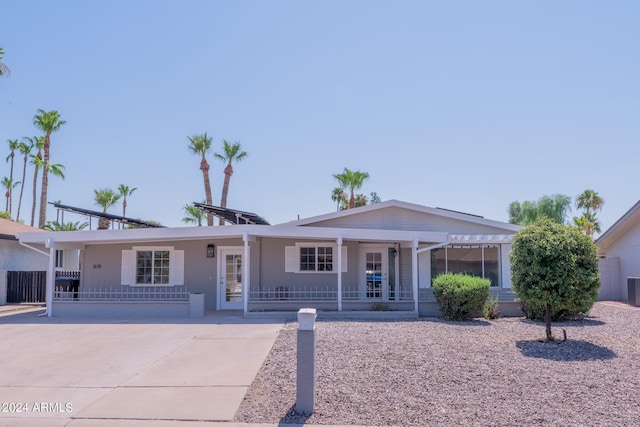 single story home featuring a porch