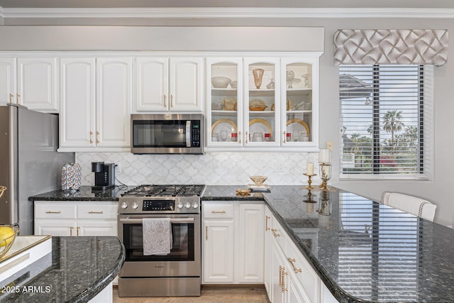 21474 N 56th Ave, Glendale, AZ 85308 - kitchen with white cabinets and appliances with stainless steel finishes