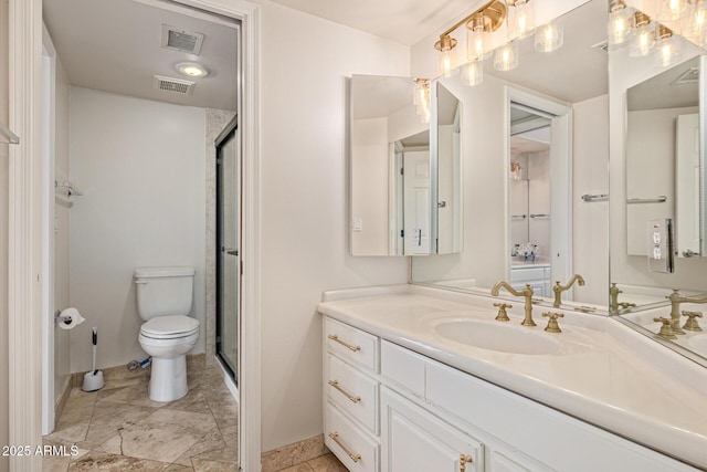 21474 N 56th Ave, Glendale, AZ 85308 - bathroom with vanity, visible vents, a stall shower, and toilet
