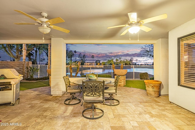 21474 N 56th Ave, Glendale, AZ 85308 - view of patio / terrace with a fenced backyard, ceiling fan, outdoor dining space, and area for grilling
