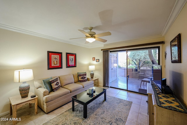 living room with ornamental molding, ceiling fan, and tile floors