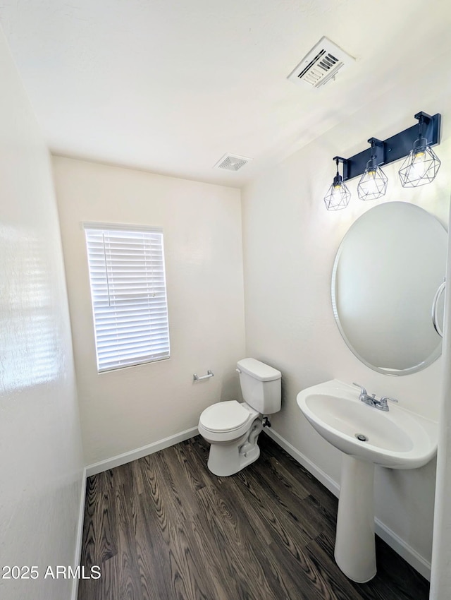 22523 W Pima St, Buckeye, AZ 85326 - bathroom with toilet and wood finished floors