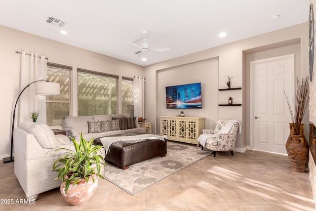 living room featuring ceiling fan