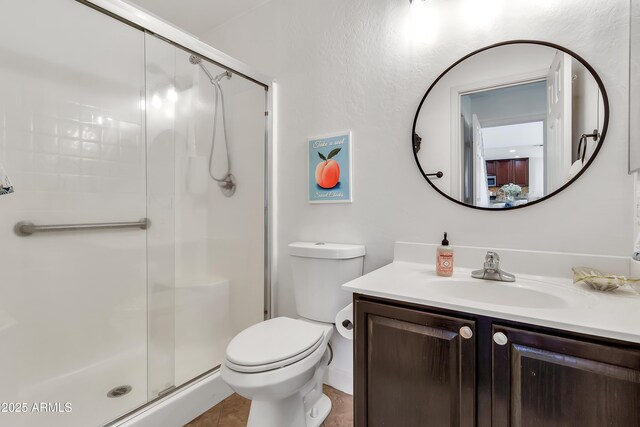 21167 E Aspen Valley Dr, Queen Creek, AZ 85142 - bathroom featuring vanity, a stall shower, and toilet