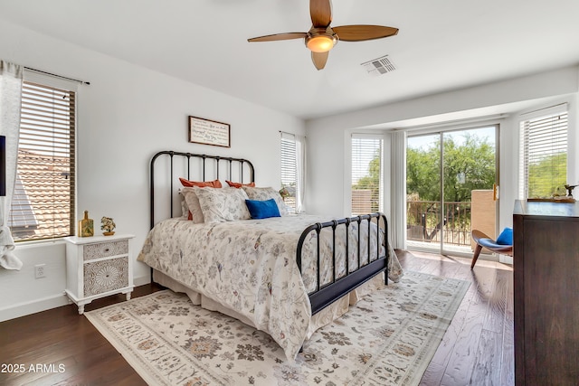 21167 E Aspen Valley Dr, Queen Creek, AZ 85142 - bedroom with access to outside, wood finished floors, baseboards, and ceiling fan