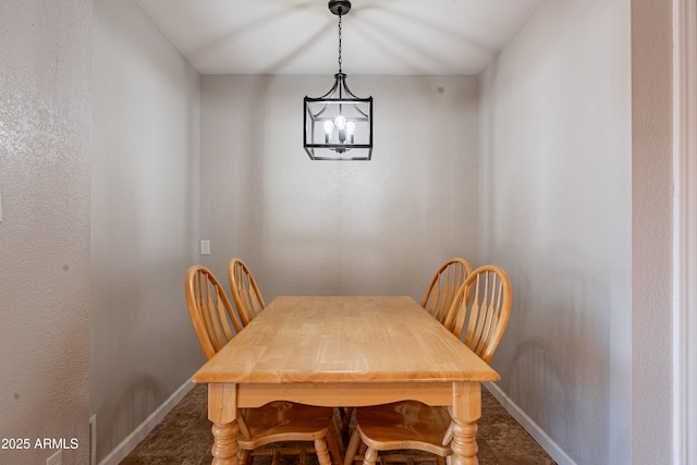 215 S 132nd St, Chandler, AZ 85225 - dining space featuring a chandelier and baseboards