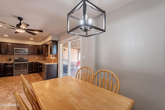 215 S 132nd St, Chandler, AZ 85225 - dining area featuring ceiling fan, light tile patterned flooring, and recessed lighting