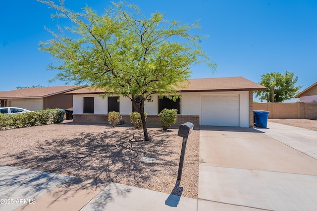 215 S 132nd St, Chandler, AZ 85225 - ranch-style home with driveway, an attached garage, and brick siding